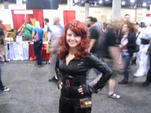 I had a hard time getting the Black Widow's attention. Finally, her boyfriend poked her in the arm and said, "Natasha, this man wants you to kill him." Killer smile, don't you think?